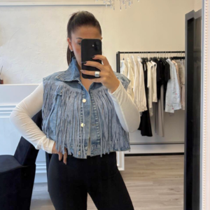 Gilet azzurro con frange