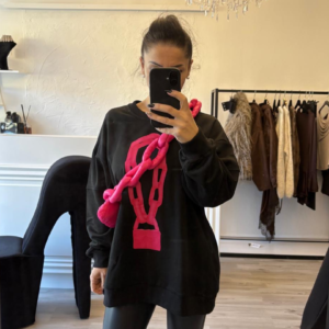 Maglione con catena removibile