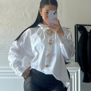 Camicia con decorazioni dorate